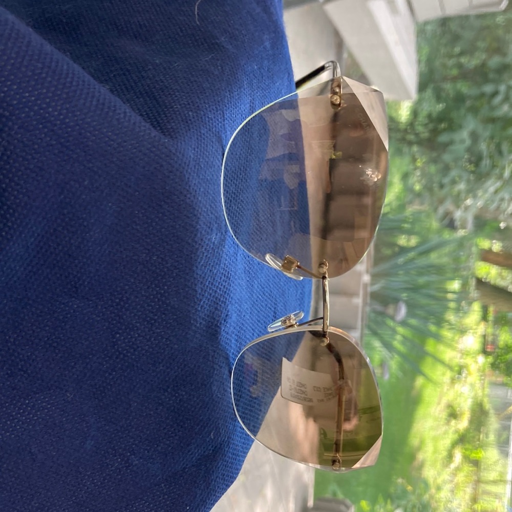 Chanel ladies sunglasses. Handles are gold metal & tortoise shell. Made in Italy